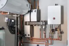 If you live in an older home, chances are you’ve heard of a back boiler. These were popular heating systems installed behind fireplaces. They provided hot water and heating by burning gas or solid fuel. But today, back boilers are outdated, inefficient, and even unsafe.