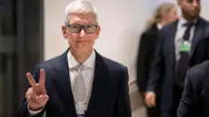 Apple has reported its strongest-ever quarterly iPhone sales, helping to lift overall revenues despite weaker performance in other parts of the business.