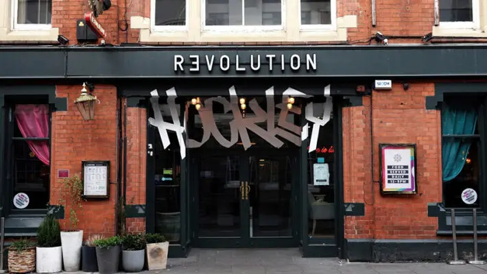The owner of Revolution Bars is preparing to enter administration, putting as many as 2,200 jobs at risk across its UK estate.