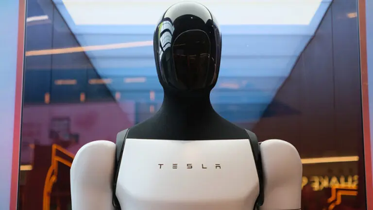 Tesla has reported its first annual fall in revenue as the electric carmaker accelerates a strategic shift away from legacy vehicle models and towards artificial intelligence and robotics.