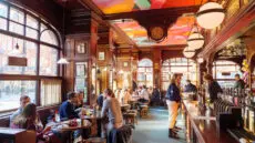 The Welsh first minister has sparked controversy after urging the public to stop watching Netflix and instead go to the pub in order to support struggling hospitality businesses.