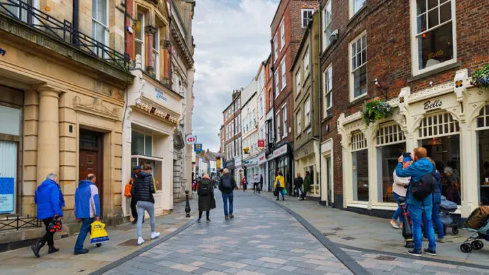 Britain's high streets enjoyed a welcome lift last month as an early Easter drew shoppers back through the doors, but retailers are warning that the bounce may prove fleeting as a fresh wave of tax rises and wage costs bears down on the sector this month.