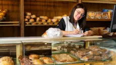 Tomorrow is May Day, and somewhere in the middle of the country, a married couple in their early forties is opening up a small bakery for the third Friday in succession on which they have not, between them, drawn a salary.