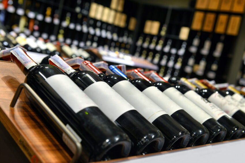 Red and white wine in bottles