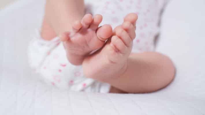 Little,Foot,Of,A,Cute,,Adorable,Newborn,Girl