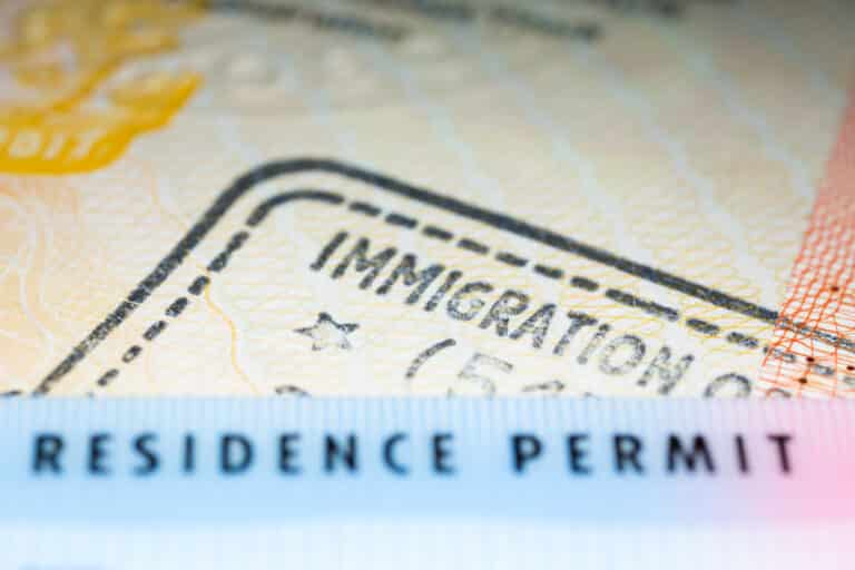 Immigration,Concept,Image.,Residence,Permit,Card,Over,Immigration,Stamp,On