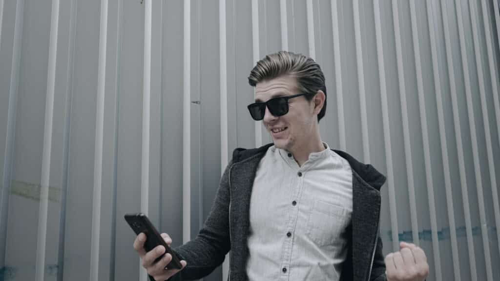 Winning,A,Game.,Reach,Goal.,Very,Happy,Boy,In,Sunglasses