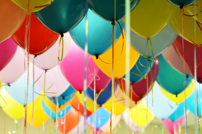 Helium,Balloons,With,Ribbons,In,The,Office.,Colorful,Festive,Background