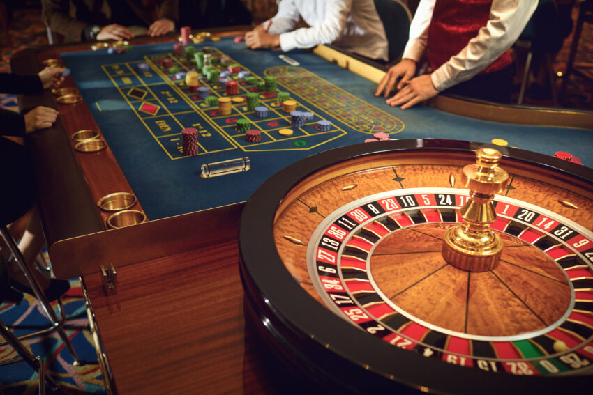People,Gambling,At,Roulette,Poker,In,A,Casino.