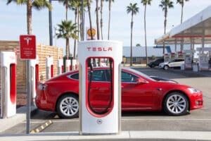 Tesla’s market value has broken through the $1tn mark for the first time after the US electric car pioneer received an order for 100,000 of its vehicles from the rental company Hertz.