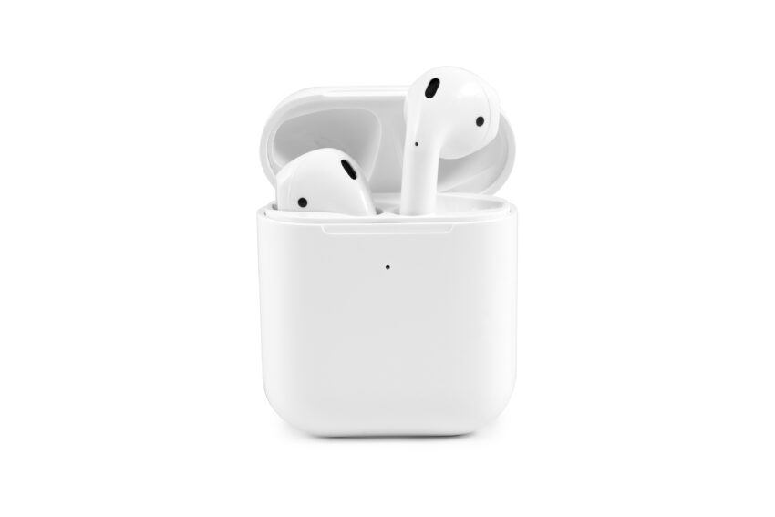 Modern,Wireless,Earbuds,Headphones,Lying,In,A,Charging,Case,Isolated