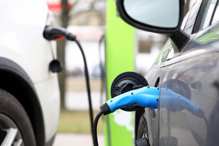 Close-up,Of,Electric,Car,Public,Charging,Station,On,City,Street.