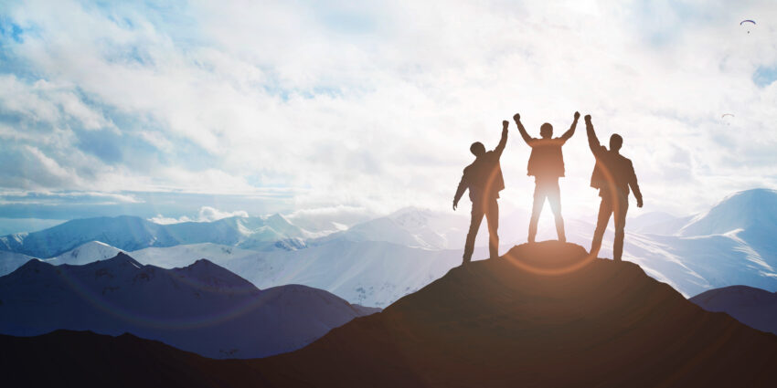 Silhouette,Of,The,Team,On,The,Mountain.,Leadership,Concept