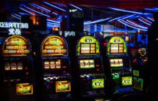 The UK government has paused plans to relax rules on high-stakes slot machines in adult gaming centres, citing concerns for vulnerable customers. Industry backlash and regulatory scrutiny follow.