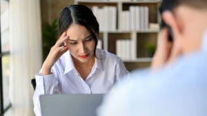 For decades, British workplaces have measured employee wellbeing in days off. A bout of flu, a chest infection, a sprained ankle: a few sick notes, a fit-to-return form, and the matter is closed.