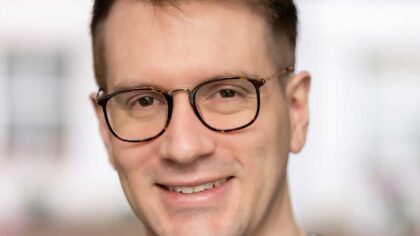 Headshot of Adam Kirby, co-founder and CEO of EvaluateLocate