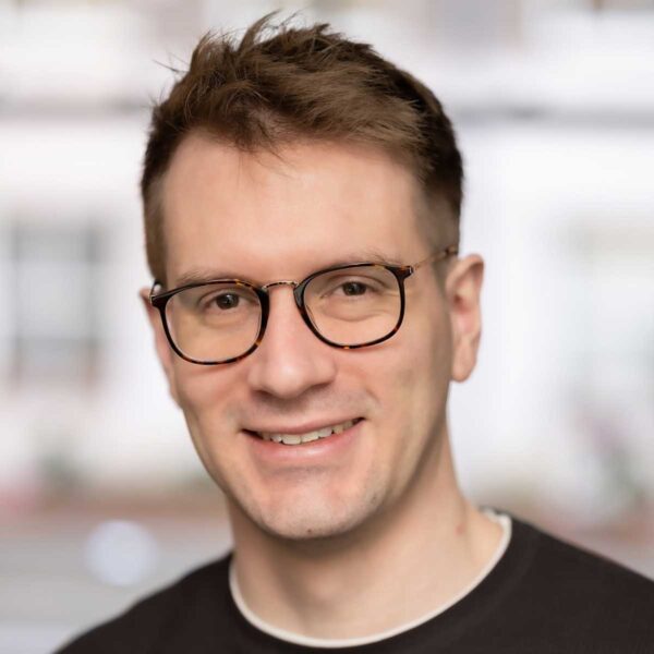 Headshot of Adam Kirby, co-founder and CEO of EvaluateLocate