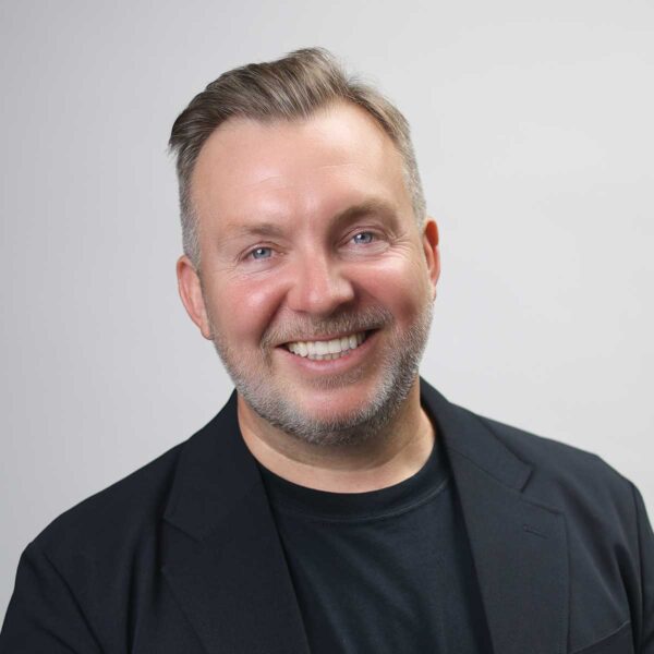 Headshot of Paul Corcoran, founder and CEO of Agent