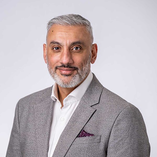 Headshot of Tanweer Khan, founder and CEO of Causee