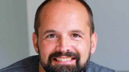 Headshot of Dion Price, CEO of Trustonic